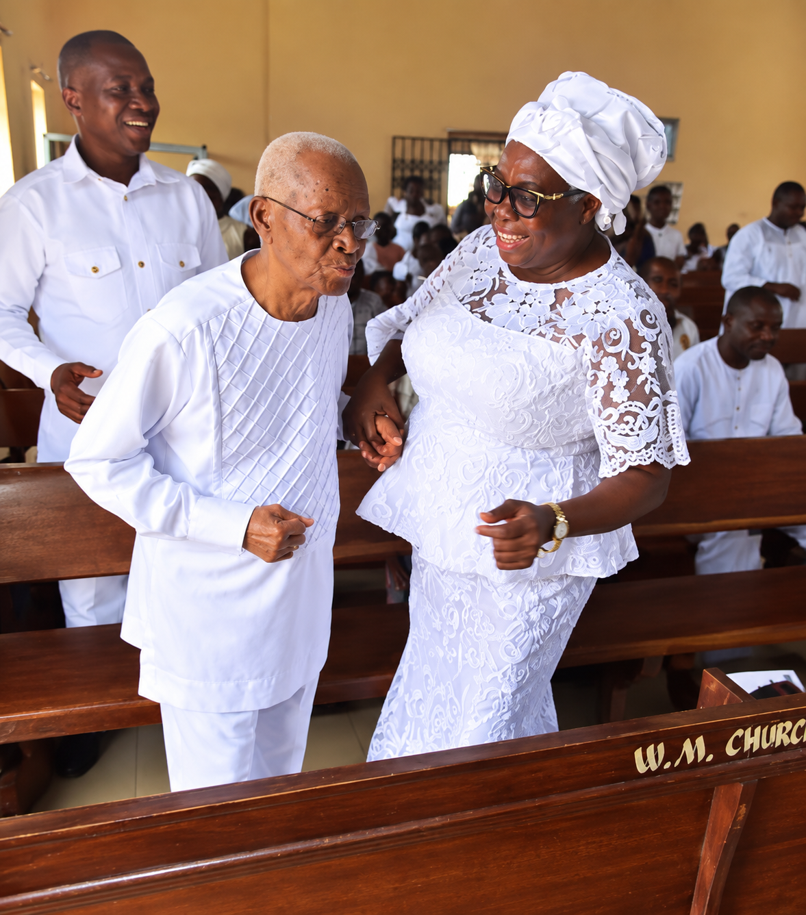 At worship in all-white — faithful to the very end